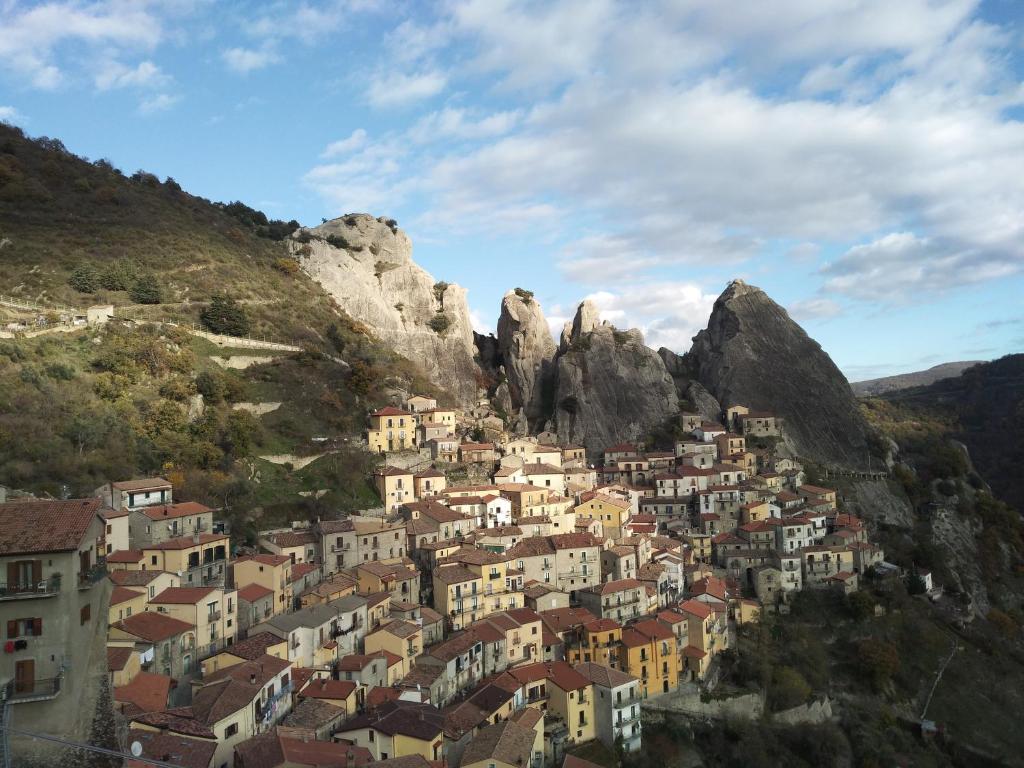 Densly crowded  3 storey buildings under the rock in Dolomites Castellmezzano