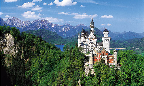 perfect 3 days in munich: The majestic neuschwanstein castle tours in center of green hilly landsscape and the sea at the back book Where to visit in 2 days in germany