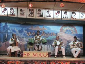 Yod abyssina traditional band with drum ,flut and kirar blue sky background wall
