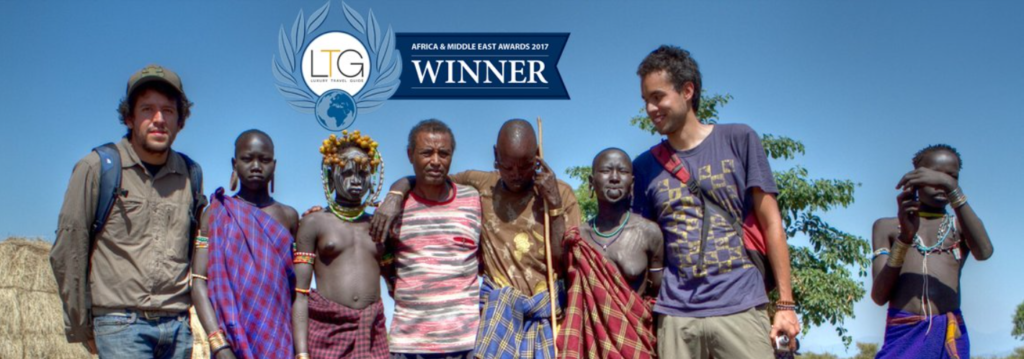Afro Tour notice of Africa & Middle Esat awards 2017 WINNER Omovalley tribe topless with tourists.